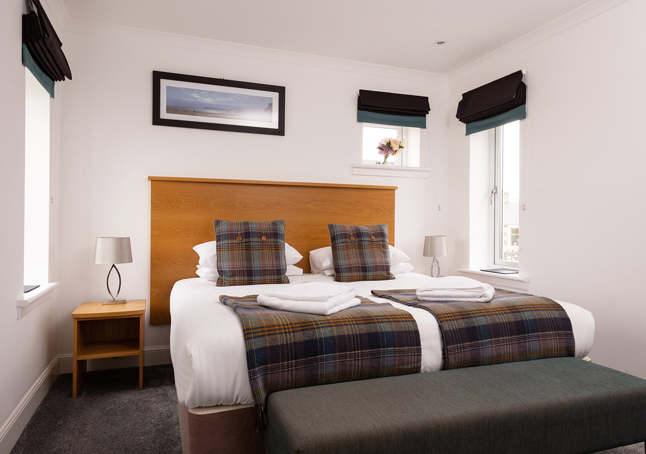 A double bed in Lodge 1 at Elderburn Luxury Lodges in Fife Scotland