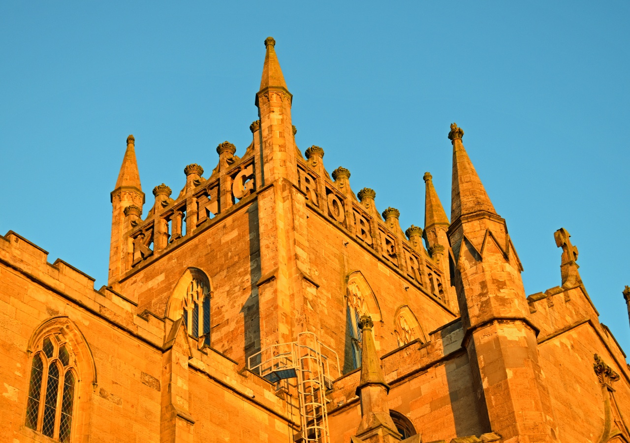 Dunfermline Abbey in golden light with tower commemorating Robert the Bruce