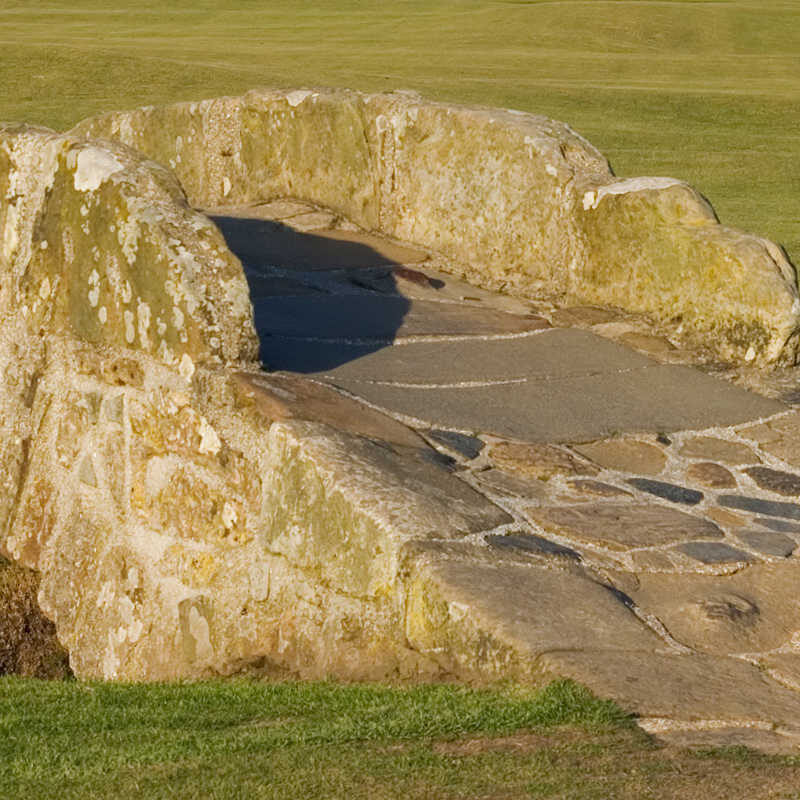 The famous Swilcan bridge on the 18th hole of the Old Course links in St Andrews, Scotland.